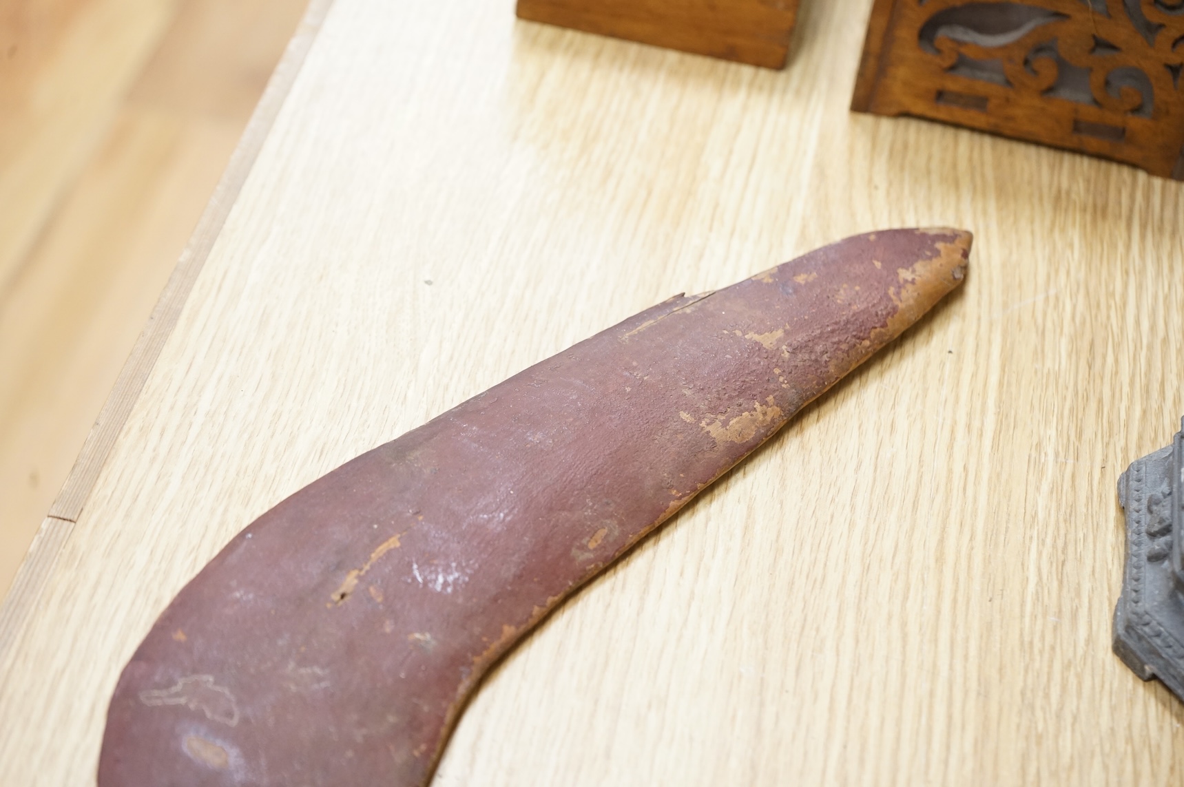An Australian aboriginal boomerang, 56cm wide, collected in Australia c.1945